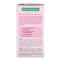 Pink Nature's Bounty hair supplements box back panel showing product benefits ingredients warnings