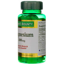 Magnesium 500 mg supplement bottle with green cap and side label text