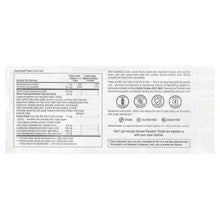 Multivitamin supplement bottle label with ingredient information and icons