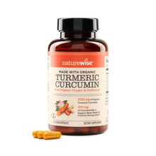 Turmeric curcumin supplement bottle with label and orange gel capsules