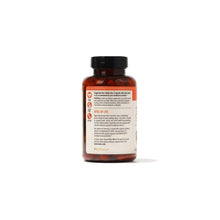 Turmeric curcumin supplement bottle with ingredient facts panel and black cap