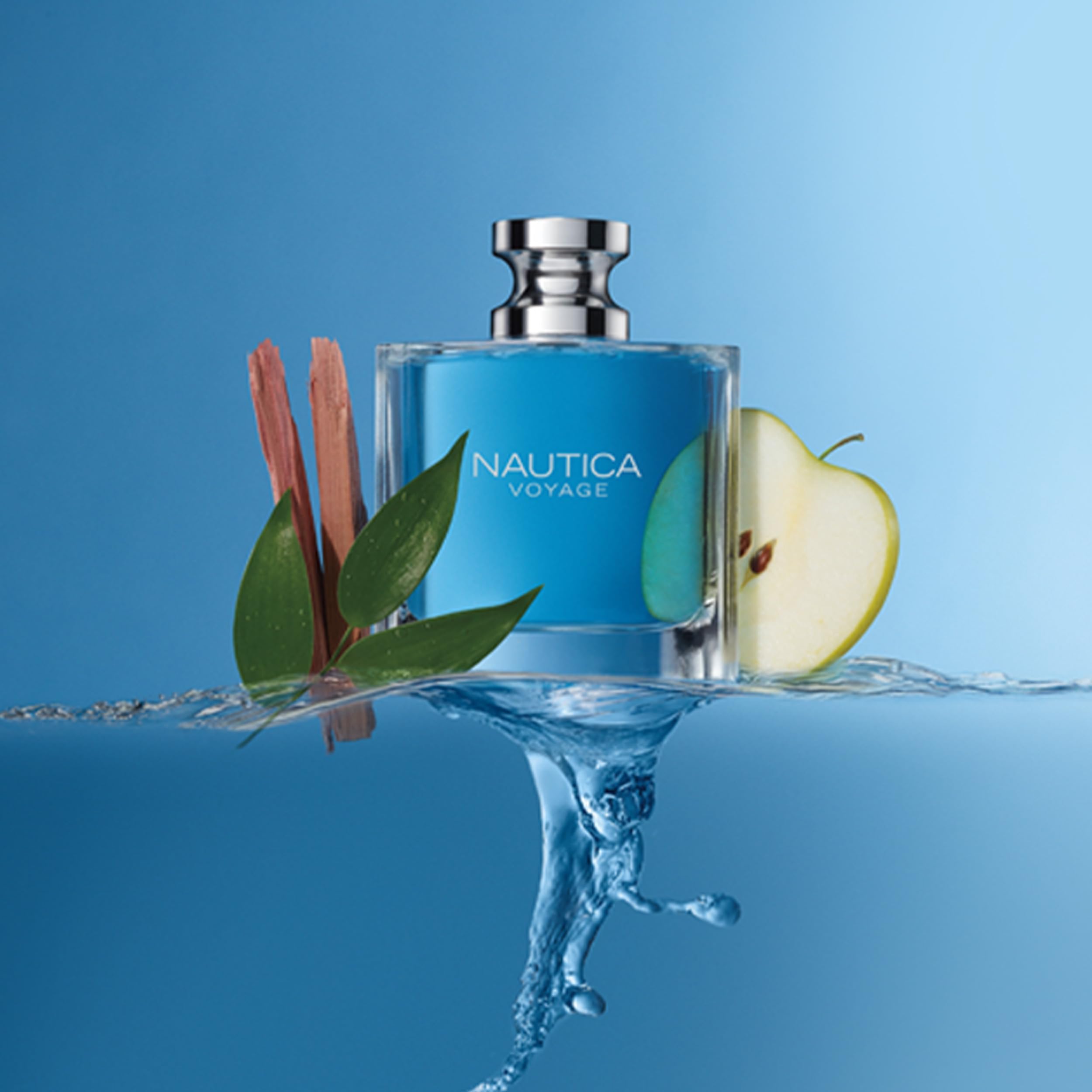 Nautica Voyage long lasting scent blue perfume bottle with apple slice and leaves on water splash