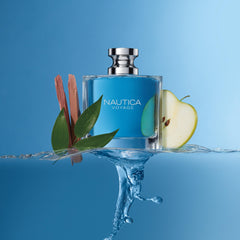 Nautica Voyage long lasting scent blue perfume bottle with apple slice and leaves on water splash