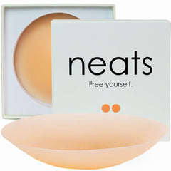 Neats reusable nipple covers for women in nude color with packaging box for discreet wear