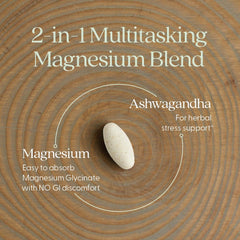 New Chapter two in one magnesium ashwagandha supplement UAE tablet on wood rings labeled Magnesium Glycinate and Ashwagandha