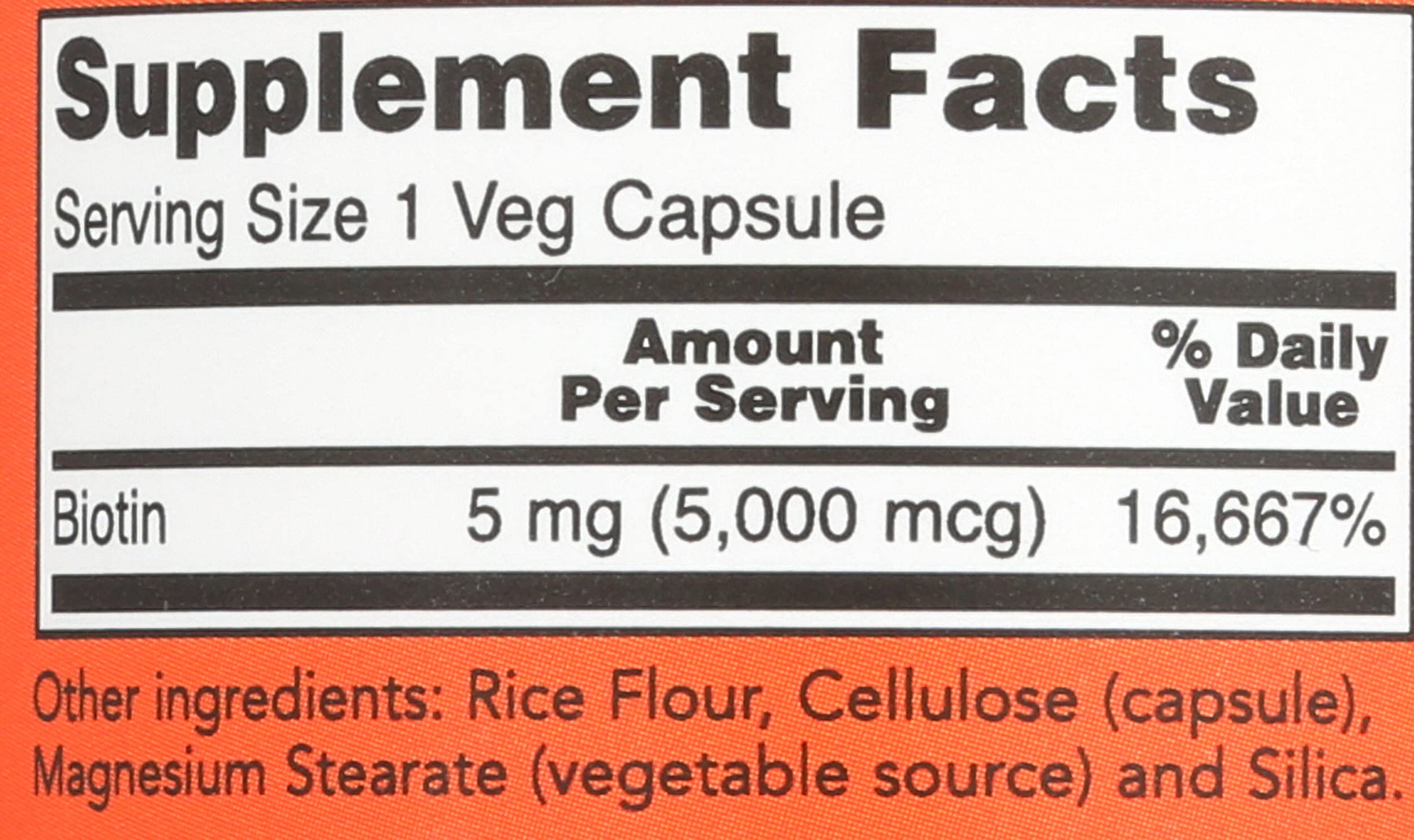 NOW Biotin 5000 mcg capsules labeled with supplement facts and serving size information