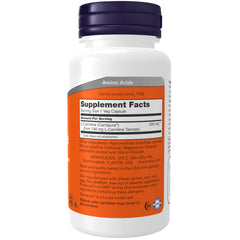 White NOW supplement bottle with purple cap showing NOW L-Carnitine veg capsules label and supplement facts