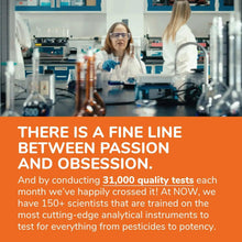 Laboratory workers in white coats with orange there is a fine line text