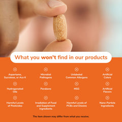 NOW herbal supplement Maca 500mg capsules UAE beige tablet held between fingers over list of excluded additives