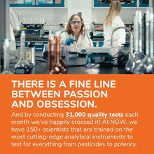 Scientist in a lab with orange text slogan on screen