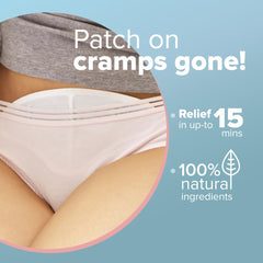 Woman wearing abdominal adhesive patch for menstrual cramps period pain relief heat patches with natural ingredients