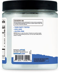 Nutricost jar of allulose sweetener 1 lb. white powdered sugar substitute in plastic container with black lid