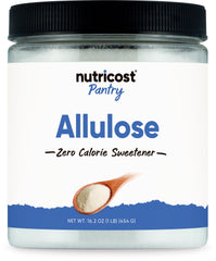 Nutricost Pantry jar of allulose sweetener 1 lb. white granulated zero calorie sweetener with wooden spoon