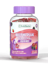 Biotin plus gummies bottle with purple cap and strawberry graphic label