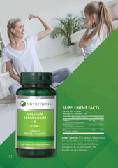 Nutritionl bottle of calcium magnesium zinc tablets UAE 100 tablets for bone health foreground mom and child exercising