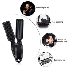 Hair tool cleaning brush with black nylon bristles and glossy black handle