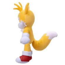 Yellow plush character in side profile with blue eyes, white gloves, and red shoes.