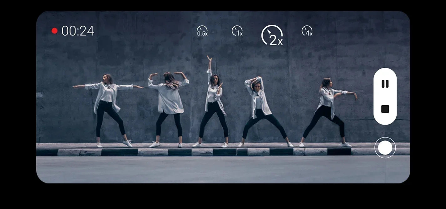 HONOR 50 used smartphone capturing a five person dance video against concrete wall in landscape view