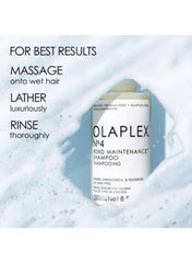 Olaplex No. 4 Bond Maintenance Shampoo bottle on a watery background for hair care routine