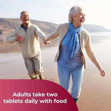 Multivitamin supplement promotional scene with two smiling seniors walking