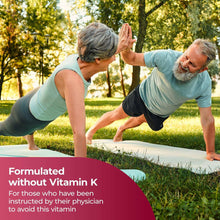 Multivitamin supplement promotional scene with two adults doing push-ups on a mat