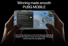 Hands holding OnePlus 13R global version smartphone in landscape showing PUBG MOBILE gameplay and adaptive frame boost