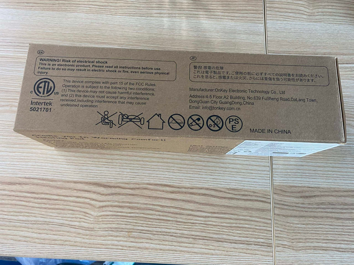 VIBOOS cardboard packaging showing labels and warnings for electric heating pad for back pain