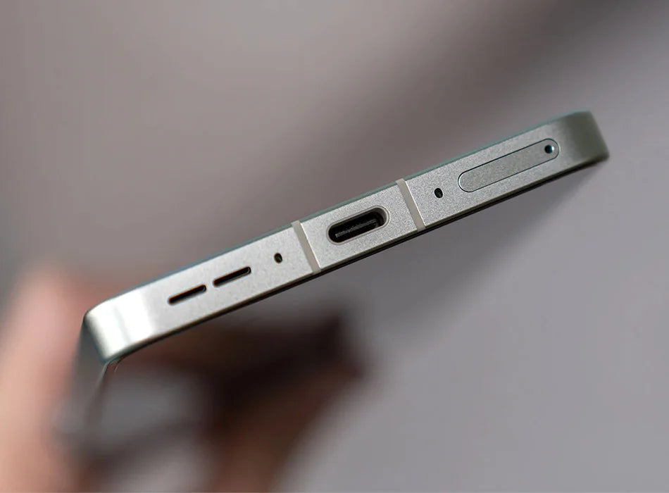 OnePlus Ace 5 5G smartphone UAE showing metallic frame with USB C port speaker vents and SIM tray