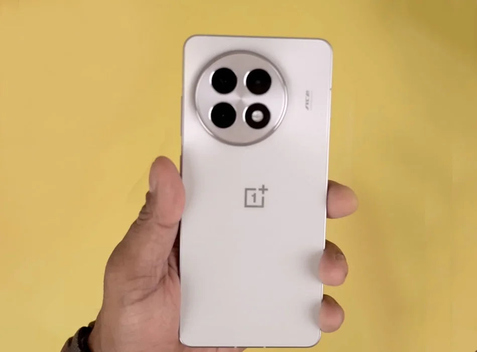 OnePlus Ace 5 5G smartphone UAE white rear view held in hand showing circular triple camera module