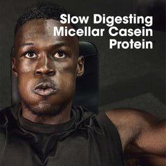 Optimum Nutrition micellar casein protein powder ad with a focused male athlete on bench press training