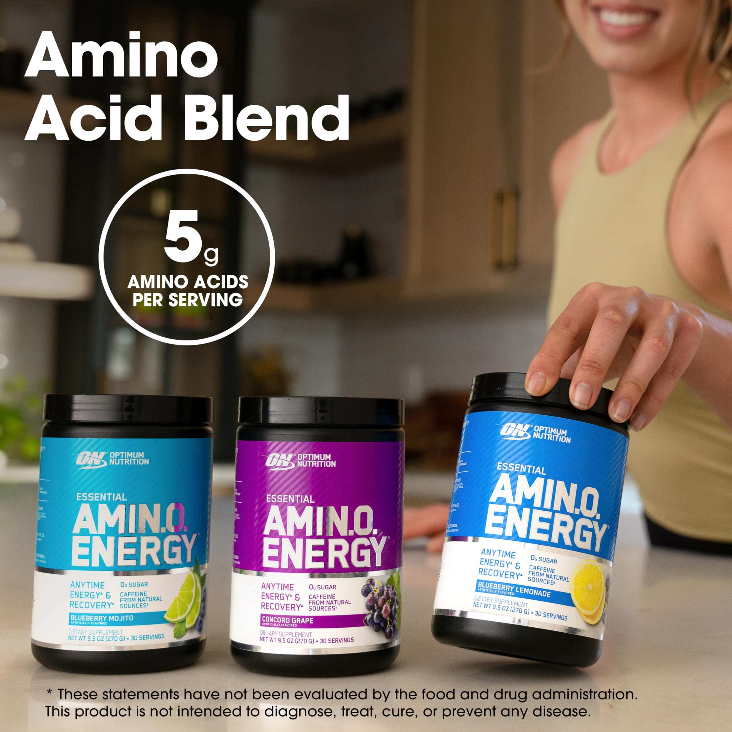 Woman reaching for three tubs of Optimum Nutrition amino acids supplement Amino Energy in lemon and grape flavors