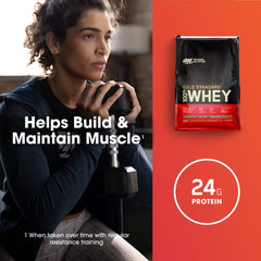 Optimum Nutrition Gold Standard 100 percent whey protein powder bag next to woman lifting dumbbell