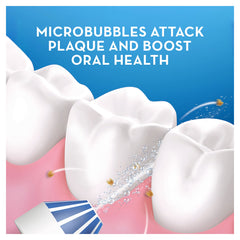 Oral-B Aquacare water flosser nozzle spraying microbubbles to remove plaque between molars