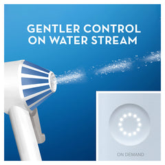 Oral-B Aquacare water flosser handheld nozzle spraying gentle water stream with LED on demand control