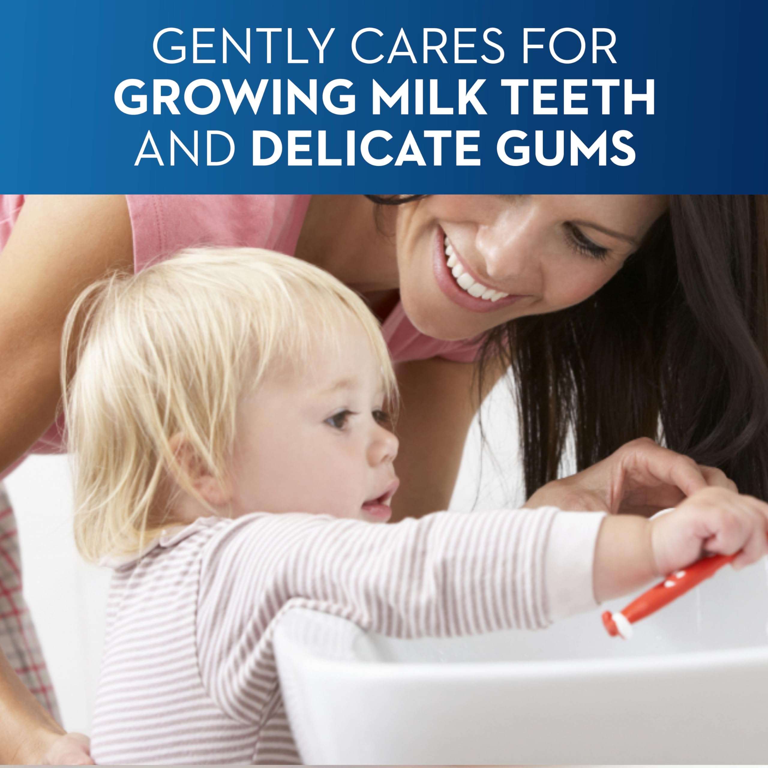 Mother helping toddler brush at sink with Oral-B baby toothpaste 0-2 years for gentle milk teeth care