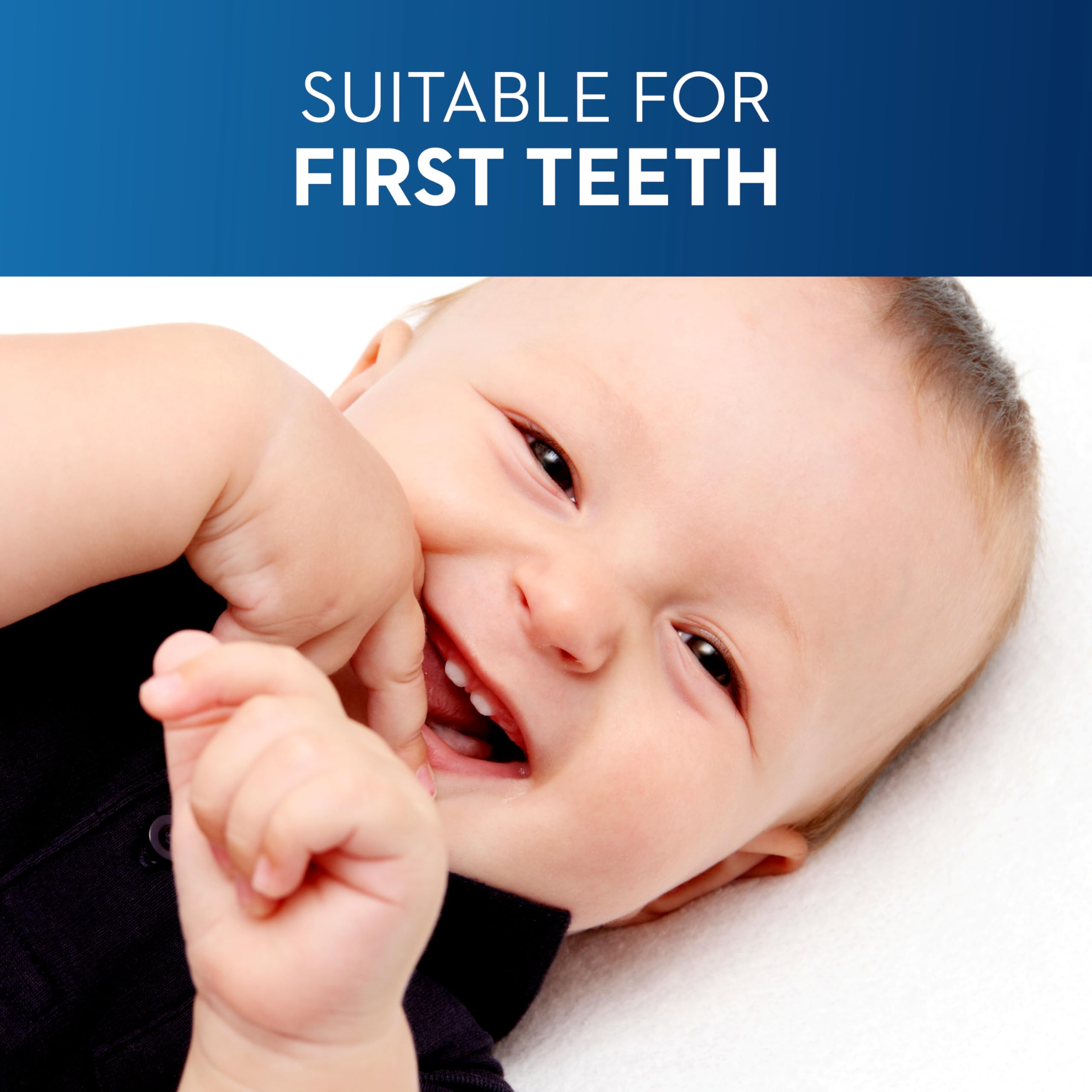 Smiling baby showing first teeth with Oral-B baby toothpaste 0-2 years for gentle early tooth care
