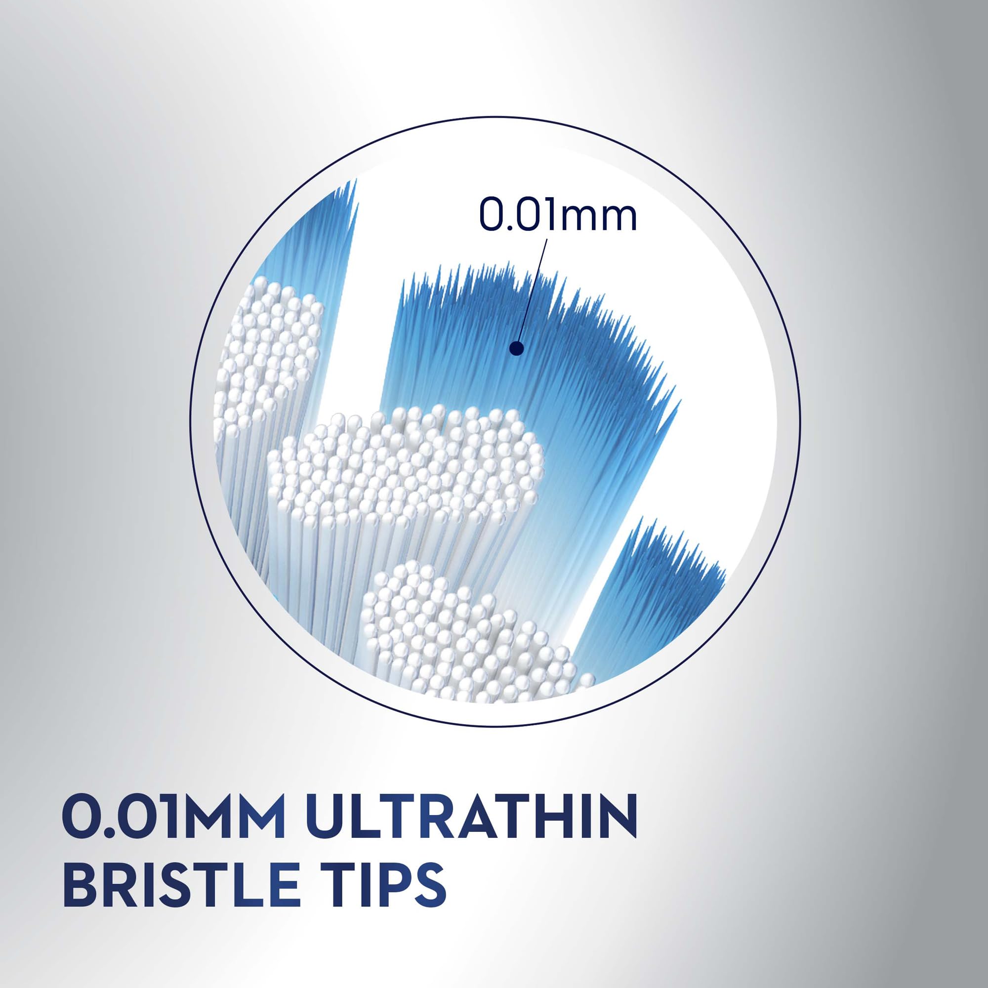 Oral-B battery powered toothbrush closeup of 0.01mm ultrathin blue and white bristle tips