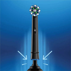 Oral-B Crossaction replacement heads on black electric toothbrush showing round brush head attachment and arrows