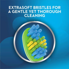 Oral-B kids toothbrush extra soft close up of multicolor extra soft bristles on green toothbrush head