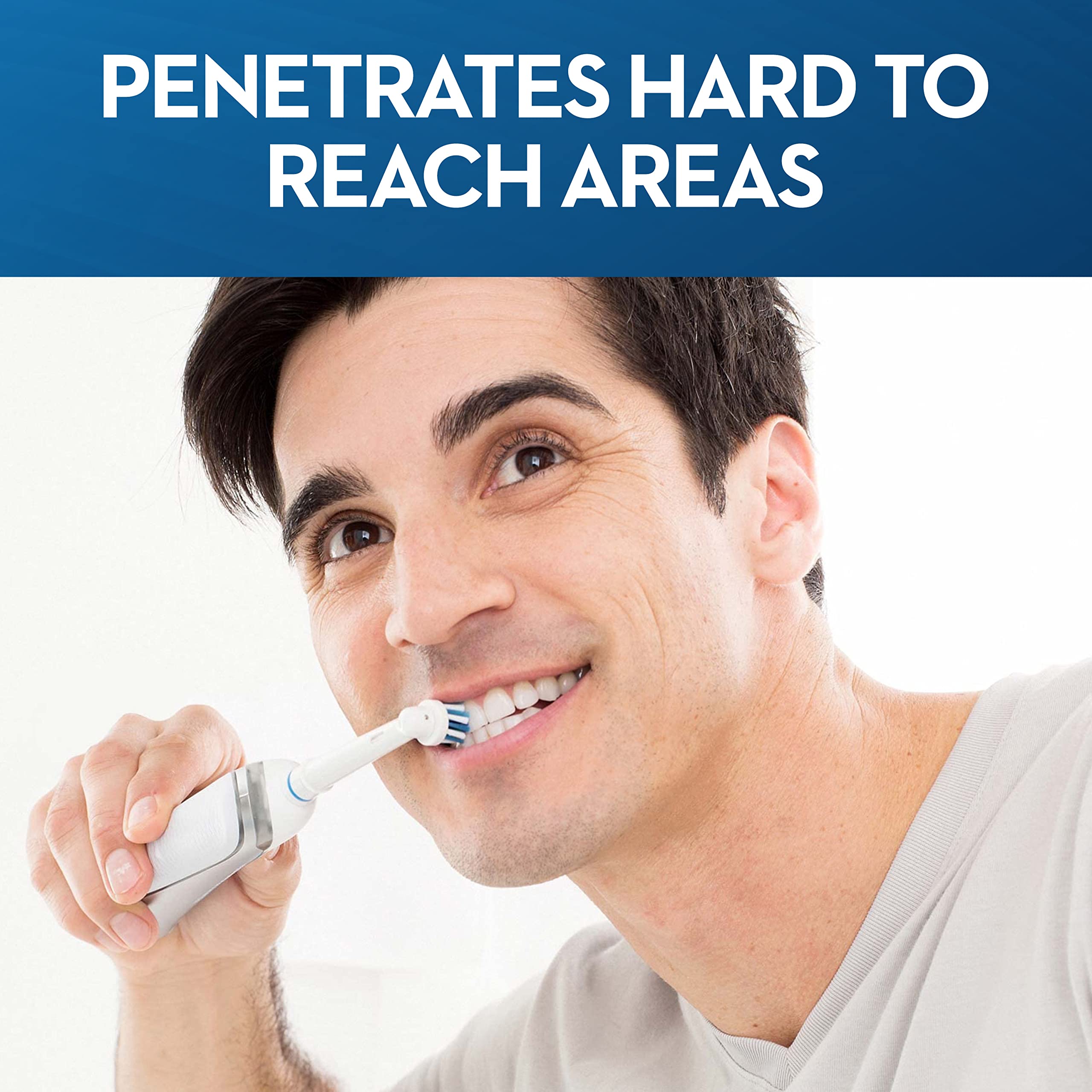 Man brushing teeth with electric toothbrush using Oral B Precision Clean replacement heads to reach back teeth