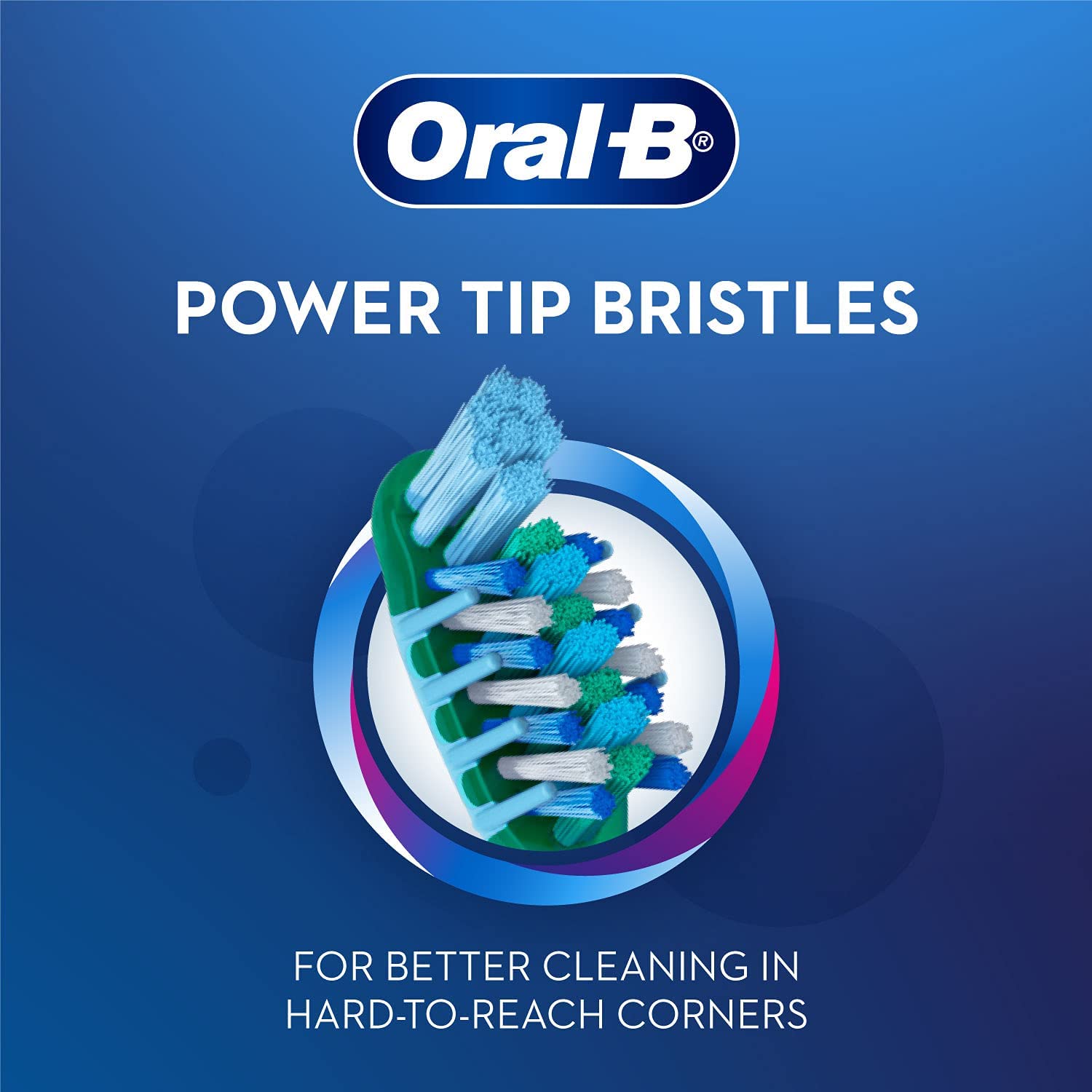 Oral-B CrissCross toothbrush for adults. Close up of angled blue green power tip bristles cleaning hard to reach corners