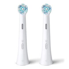 Pair of Oral-B iO replacement brush heads with blue and teal round bristles for electric toothbrush