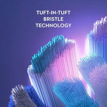 Close-up bristle technology image with dense blue and white brush fibers
