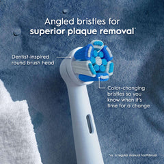 Close up of white electric toothbrush round head with angled blue color changing bristles Oral-B iO Series replacement brush heads