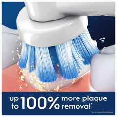 Oral-B Pro Sensitive Clean toothbrush heads round brush head removing plaque from teeth close up