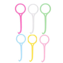 Six grip-ring aligner remover tools in assorted pastel colors