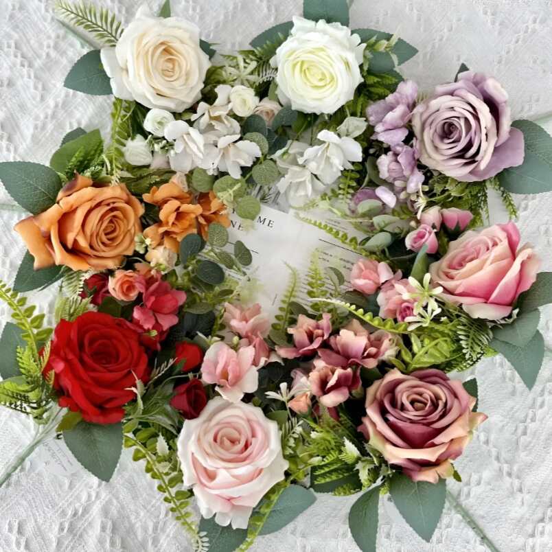 Orange artificial flower decor wreath with mixed roses and green leaves by Huitich