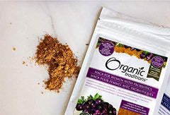 Organic Traditions pouch of maca powder for women with probiotics with spilled brown powder and berries on label