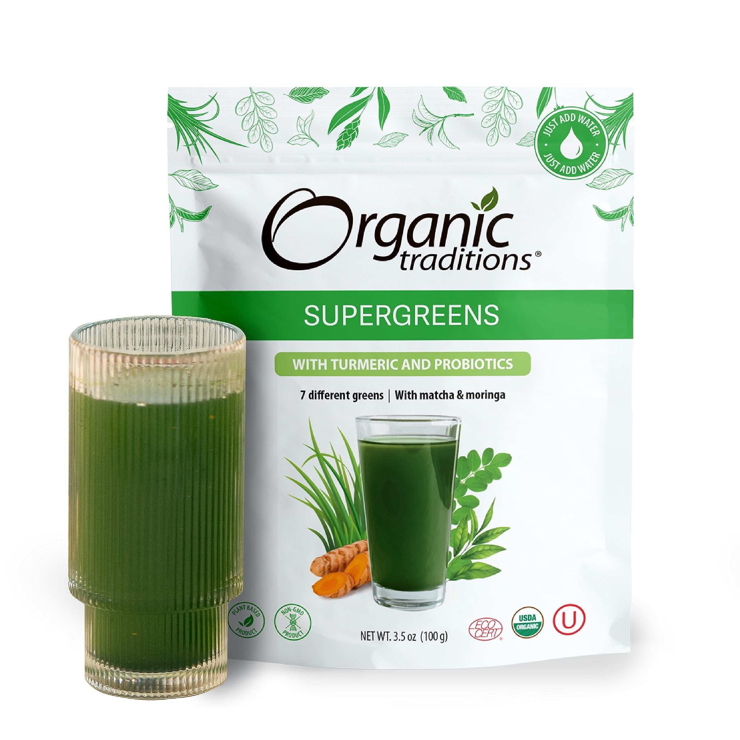 Organic Traditions supergreens powder with turmeric and probiotics pouch with poured green smoothie in two clear glasses
