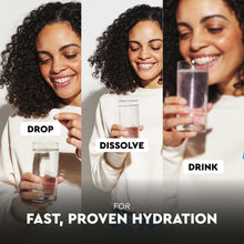 Hydration tablets dissolving in water with smiling woman holding a glass